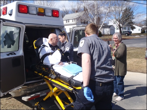 Joe on ambulance stretcher